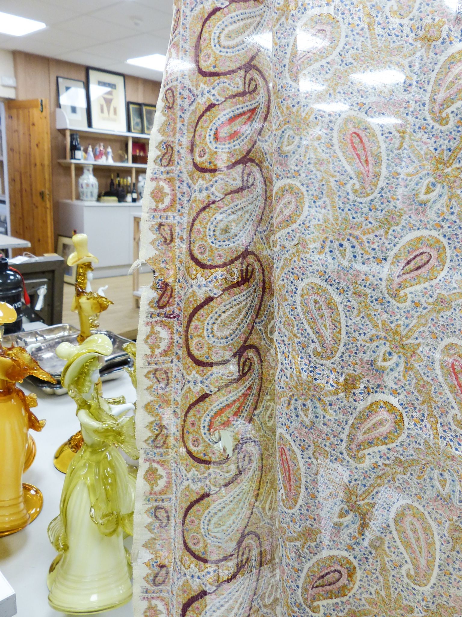 A Paisley pattern silk shaw (damaged) together with two Kelim woven bags (3)